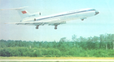 The plane TU-154 is flying